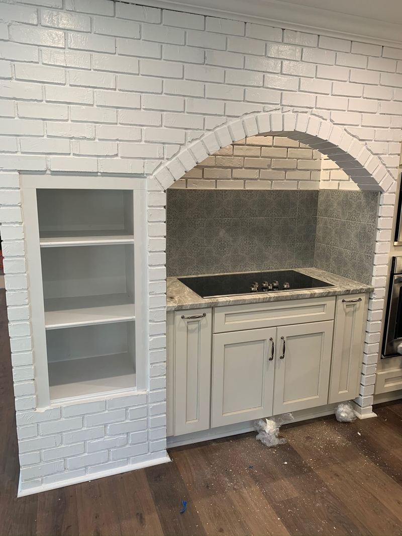 Arched brick range alcove