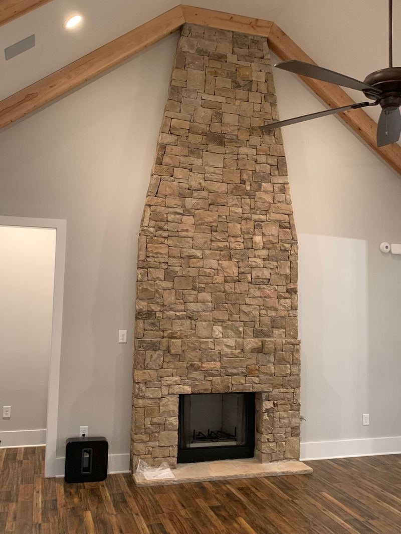 Stacked-stone fireplace, vaulted ceiling