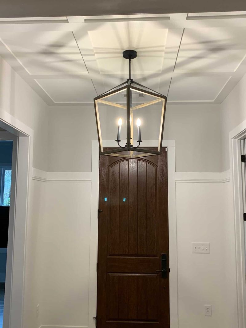 Entry with lantern pendant and board-and-batten