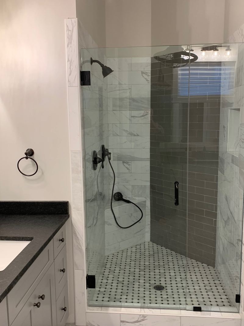 Walk-in tile shower with glass