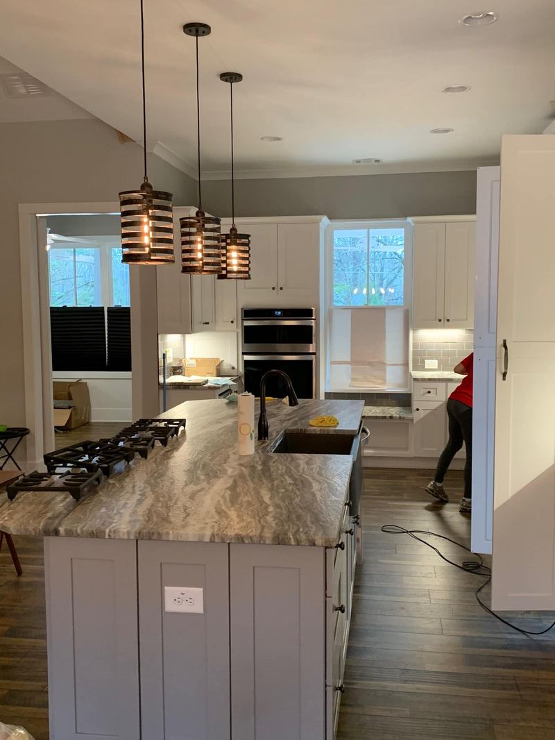 Open kitchen with pendant lighting