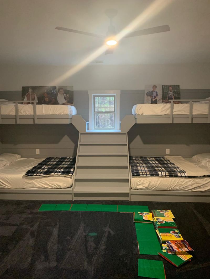 Bunk room with built-in beds