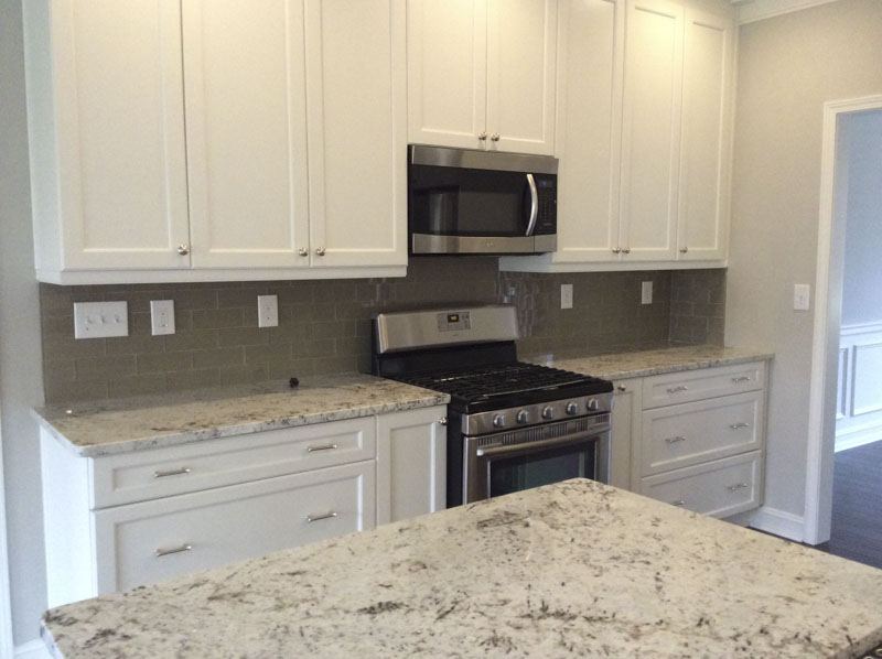 White kitchen with granite